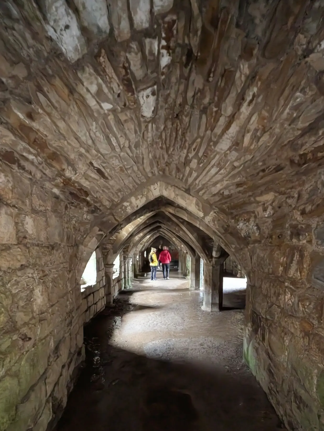 The vaulted stone passage inside Finchale Abbey